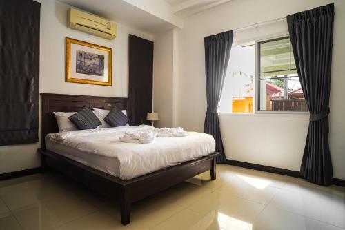 Katil atau katil-katil dalam bilik di King Family Massarossa Pool Villa Pattaya VIP