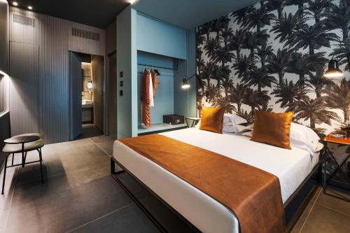Postel nebo postele na pokoji v ubytování Catania Smart Hotel
