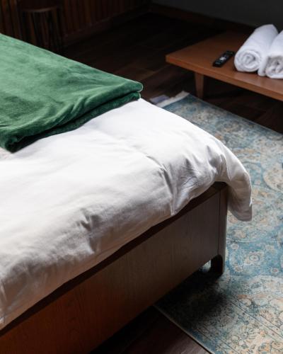 Postel nebo postele na pokoji v ubytování Thea Hotel