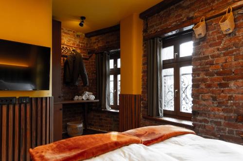 Postel nebo postele na pokoji v ubytování Thea Hotel