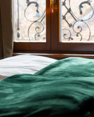 Postel nebo postele na pokoji v ubytování Thea Hotel