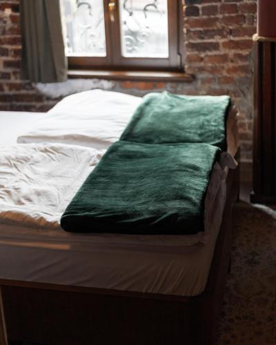 Postel nebo postele na pokoji v ubytování Thea Hotel