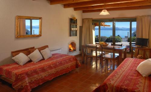 Postel nebo postele na pokoji v ubytování La Caleta Bungalows
