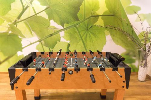 a chess board with beads on it on a table at Kaiserhof Feldberg in Feldberg