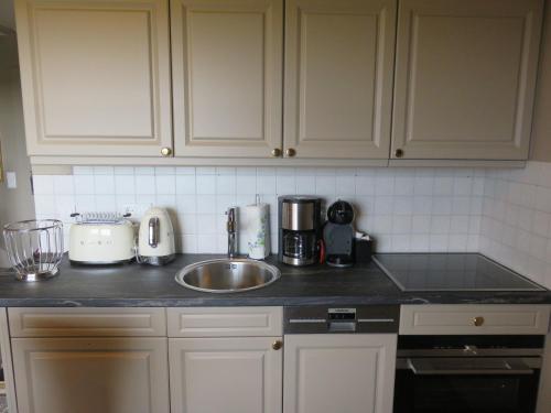 Η κουζίνα ή μικρή κουζίνα στο Schöne Ferienwohnung In Morsum