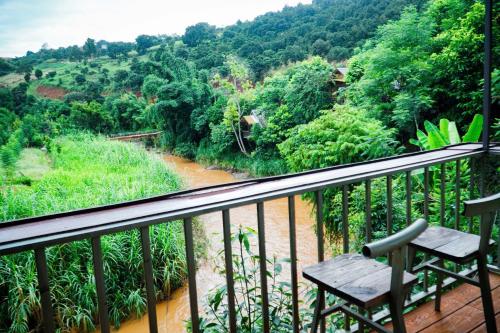 Фотография из галереи Nhà Bên Suối Homestay&coffee в городе Hoat