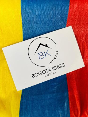 a white tag on a colorful blanket at Bogotá Kings 302 in Bogotá