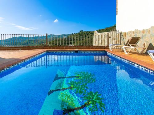 Bazén v ubytovaní Holiday Home Tres Palmeras by Interhome alebo v jeho blízkosti