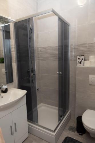Ένα μπάνιο στο Apartmani Mesko