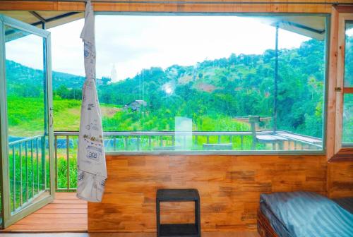 Фотография из галереи Nhà Bên Suối Homestay&coffee в городе Hoat