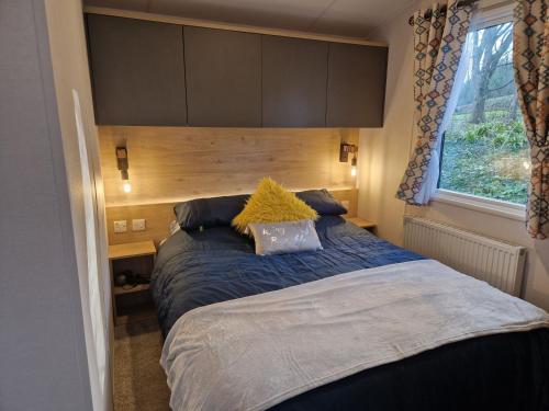 Postel nebo postele na pokoji v ubytování Lydstep Beach Village - 202 Beach Drive