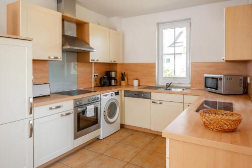 Kuchyň nebo kuchyňský kout v ubytování Ferienhaus Jaguar