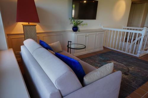 Μια τηλεόραση ή/και κέντρο ψυχαγωγίας στο Wohnung In Morsum Mit Terrasse