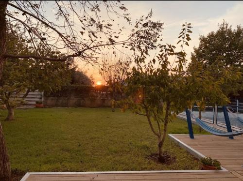 a park with a playground with a swing at סוויטת לורד הרמיטאז' בגולן in Bruchim Qela' Alon