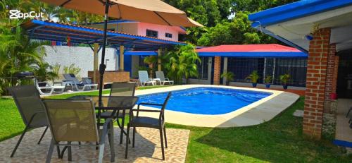 Πισίνα στο ή κοντά στο Hostal Villa Mayte Coronado