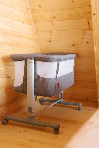 an office chair in a room with a wooden ceiling at Vikendica miRAJ Manjaca in Gornje Ratkovo