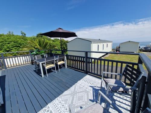 Balkón nebo terasa v ubytování Lydstep Beach Village - 385 Bay View