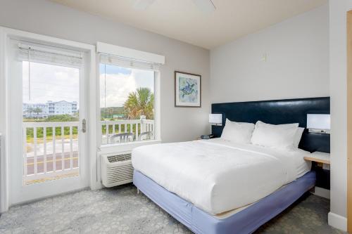 Postel nebo postele na pokoji v ubytování Seaside Amelia Inn - Amelia Island