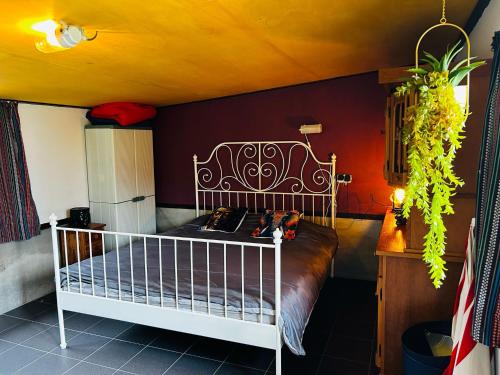 a bedroom with a white crib in a room at Schuilstal in Elim