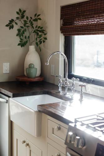 a kitchen counter with a sink and a window at The Bend in Phoenicia