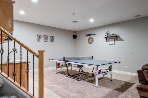 a dining room with a ping pong table in it at Northridge Mesa in Mesa