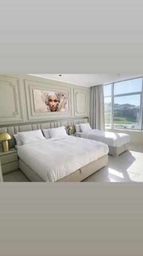 Ένα ή περισσότερα κρεβάτια σε δωμάτιο στο Hilton Tanger Penthouse 17