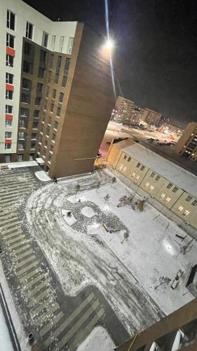 a view from the top of a building at night at ЖК Dezi park in Kokshetau