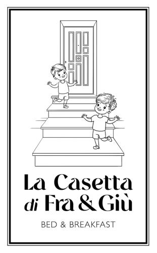 two children playing on the stairs of a building at La casetta di Fra & Giù in Longobucco