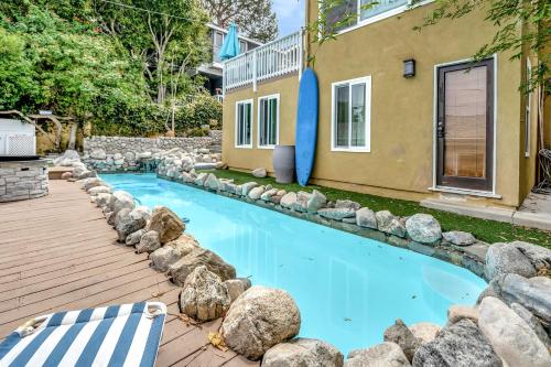 a swimming pool with rocks around a house at El Segundo Beach 5B4b Home, POOL Hot Tub, BEACHES, Local Town! in El Segundo