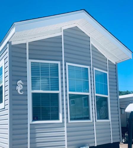 a house with a large window on the side of it at Casa Seahorse in Key Largo