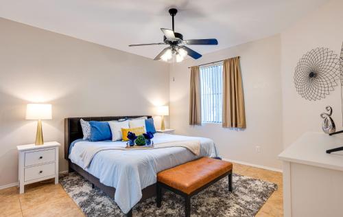 a bedroom with a bed and a ceiling fan at Southern #2068 Mesa in Mesa