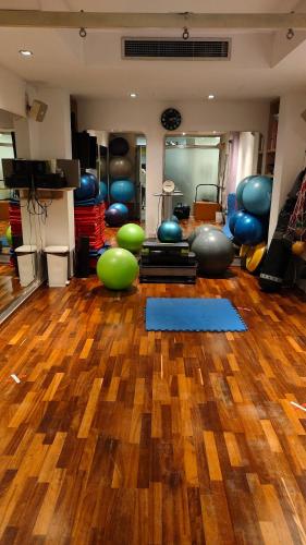 a gym with a bunch of pilates balls on the floor at Déjà Blue Apartment Kyklades BC7 - workspace, pool, gym, nearby beach in Protaras