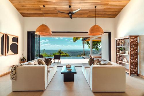 Posezení v ubytování Arbórea Villas