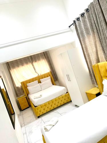 Ένα ή περισσότερα κρεβάτια σε δωμάτιο στο De Dreamz Guest House