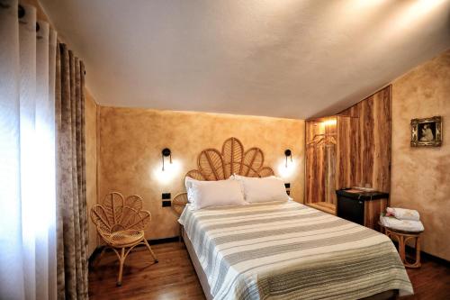 Ein Bett oder Betten in einem Zimmer der Unterkunft Hotel Labiatan