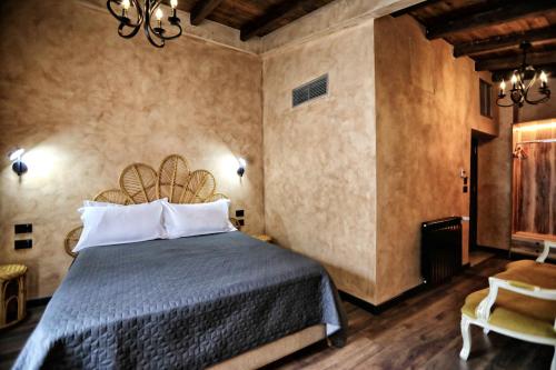 Ein Bett oder Betten in einem Zimmer der Unterkunft Hotel Labiatan