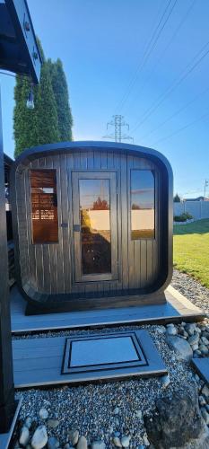 a train is sitting on the tracks at Staycation Oasis! a unique Experience! Heated pool open until October 31st in Easton