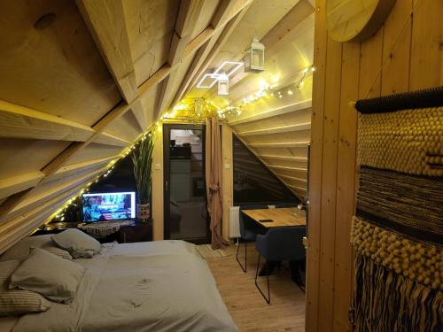 Una cama o camas en una habitación de Chalet-Beskydy