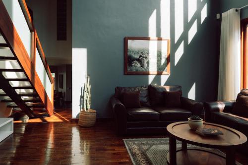 a living room with a couch and a table at The Scenery Residence in Arusha