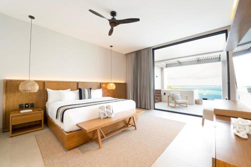 Postel nebo postele na pokoji v ubytování Amaranto Bacalar Hotel Boutique