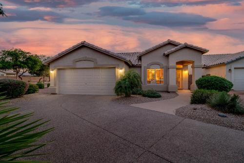 a house with a garage in a residential neighborhood at Ironwood Gilbert in Gilbert
