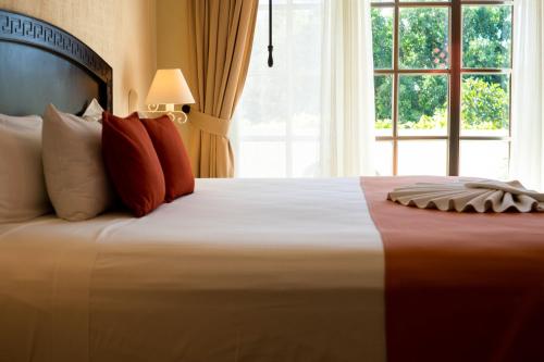Cama ou camas em um quarto em Hotel Posada Sian Kaan Playa del Carmen