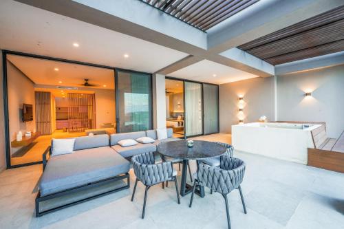 Posezení v ubytování Amaranto Bacalar Hotel Boutique
