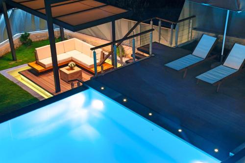 Πισίνα στο ή κοντά στο Haus In Kavallos Mit Privatem Pool Und Panoramablick