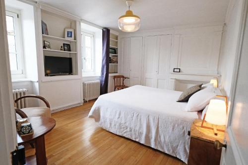 Posteľ alebo postele v izbe v ubytovaní Contes à Rebours - Chambres d'hôtes