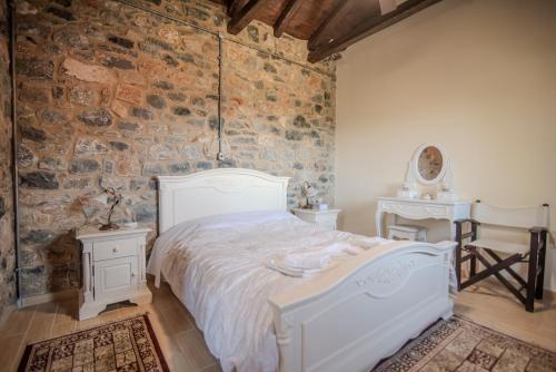 Postel nebo postele na pokoji v ubytování Villa Mainalis