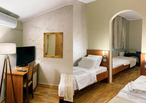 Postel nebo postele na pokoji v ubytování Hotel IL Sole