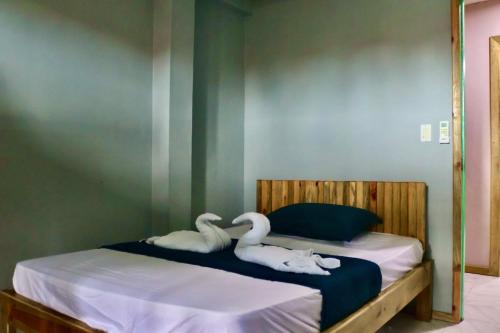 Ένα ή περισσότερα κρεβάτια σε δωμάτιο στο Dreamer's Hostel