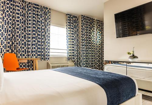 Katil atau katil-katil dalam bilik di Oceanside Hotel and Suites