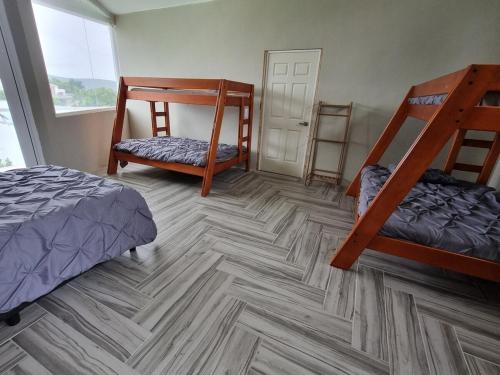 Postel nebo postele na pokoji v ubytování Casa mahuizo